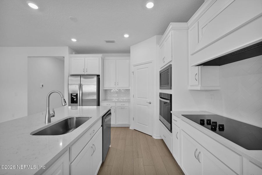 Furnished interior view inside a new home in Hyland Trail, Green Cove Springs (Image 6).