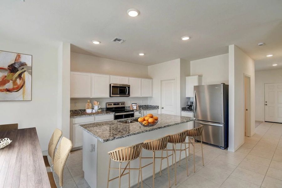 Representative furnished interior of a home built from the Spectra by Starlight Homes in Hawks Run, Kissimmee (Image 4). Representative furnished interior of a home built from the Spectra by Starlight Homes in Hawks Run, Kissimmee (Image 4).