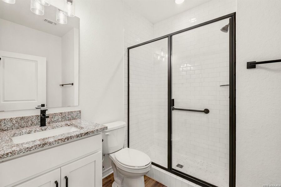 Furnished interior view inside a new home in , New Braunfels (Image 11).