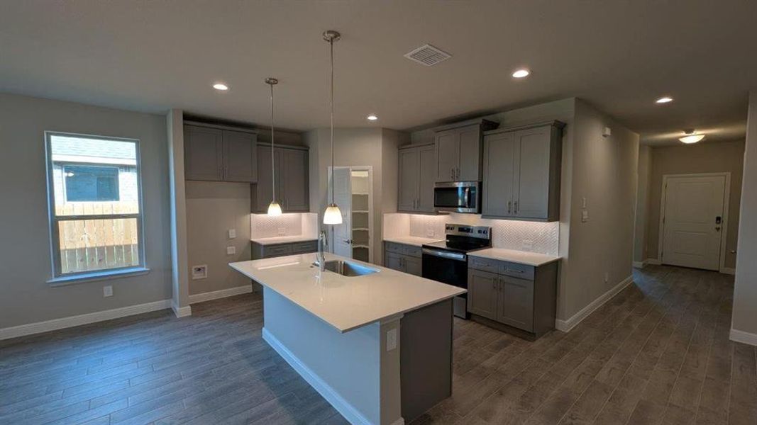 Kitchen - All Home and community information, including pricing, included features, terms, availability and amenities, are subject to change at any time without notice or obligation. All Drawings, pictures, photographs, video, square footages, floor plans, elevations, features, colors and sizes are approximate for illustration purposes only and will vary from the homes as built.