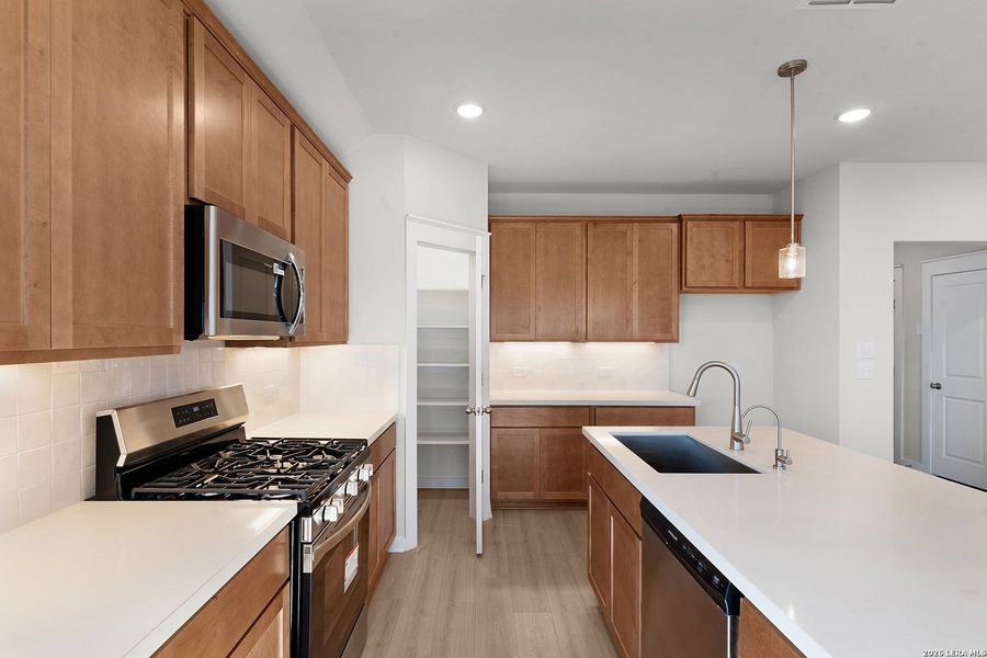 Furnished interior view inside a new home in Westridge, San Antonio (Image 5).