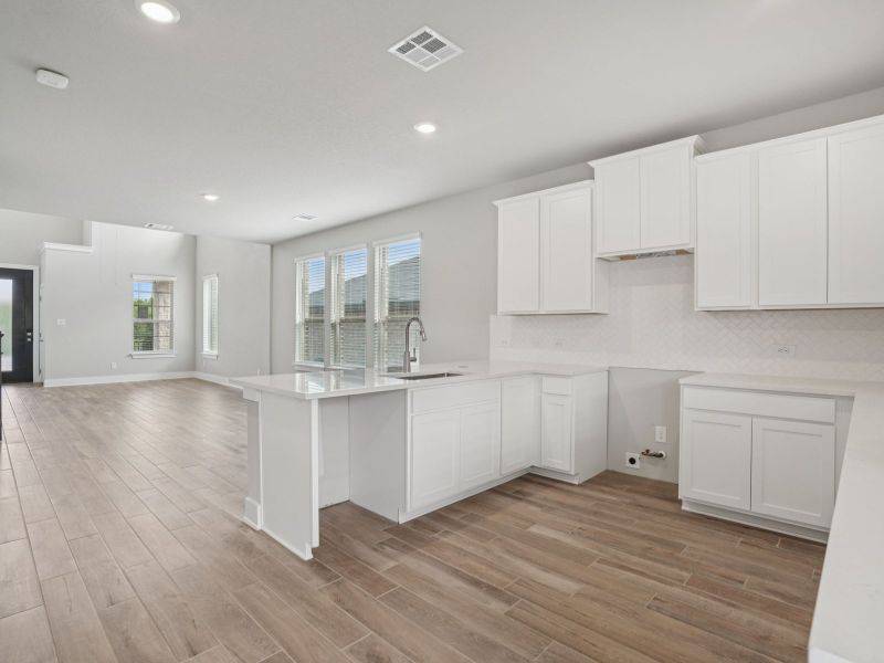 Kitchen in the Medina floorplan at a Meritage Homes community. Kitchen in the Medina floorplan at a Meritage Homes community.