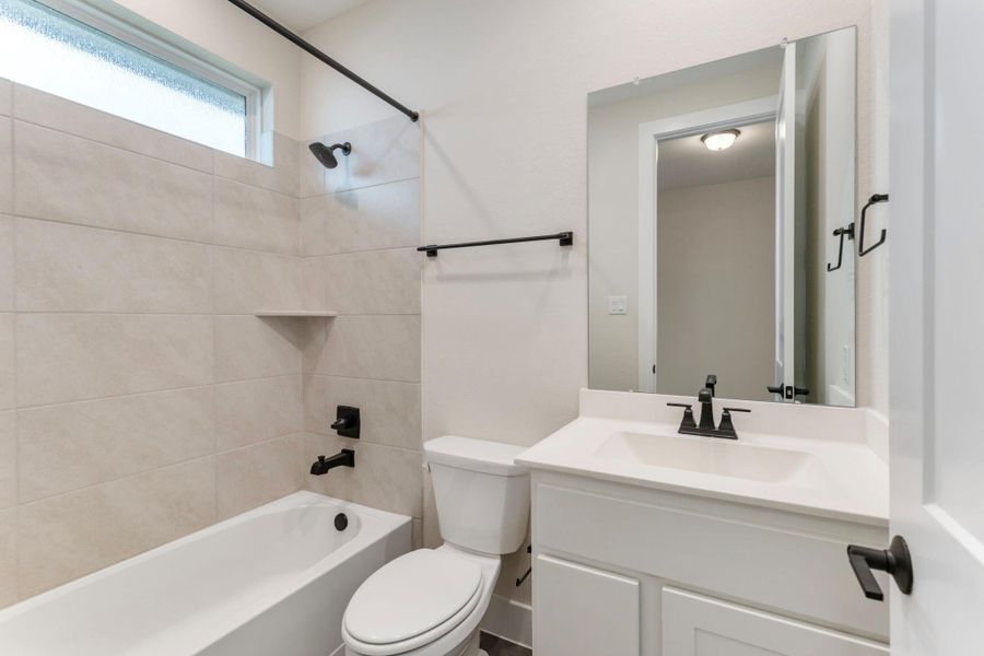 Furnished interior view inside a new home in , The Woodlands (Image 7).