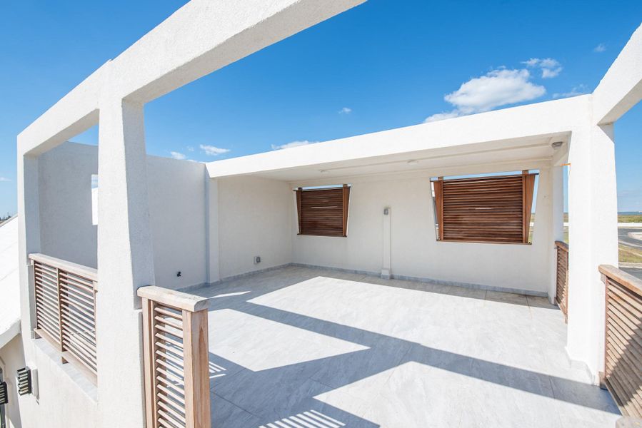 Exterior details and patio area of a home in , Port Aransas (Image 21).