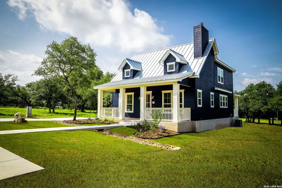 Front exterior of a new home in , Blanco, TX, highlighting curb appeal (Image 1). Front exterior of a new home in , Blanco, TX, highlighting curb appeal (Image 1).