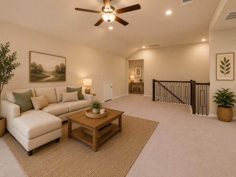 A comfortable great room awaits with vaulted ceilings and a stylish ceiling fan for year-round comfort. A comfortable great room awaits with vaulted ceilings and a stylish ceiling fan for year-round comfort.
