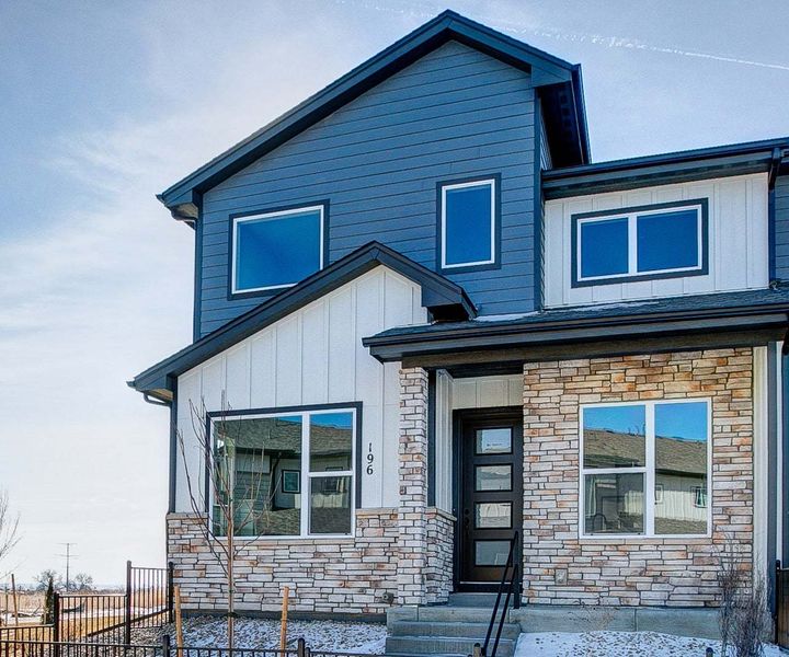 Representative exterior photo of a completed home built from the Addison 2 by Landmark Homes in Highlands at Fox Hill - The Towns, Longmont, CO (Image 13).