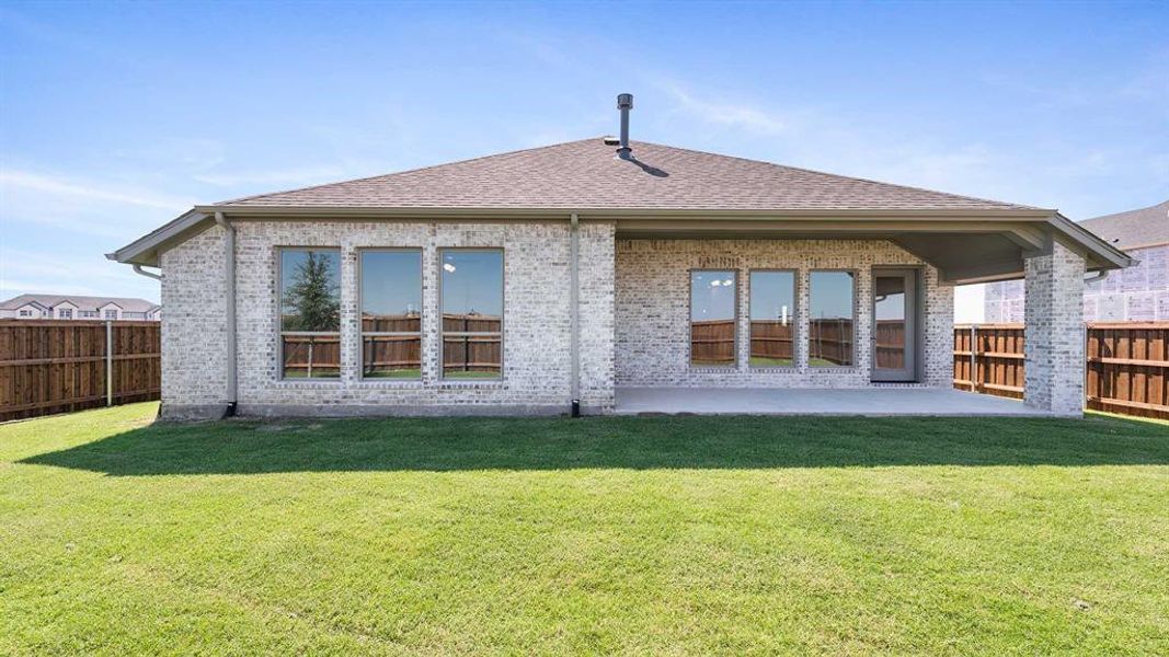 Front exterior of a new home in Mosaic 50', Celina, TX, highlighting curb appeal (Image 1). Front exterior of a new home in Mosaic 50', Celina, TX, highlighting curb appeal (Image 1).
