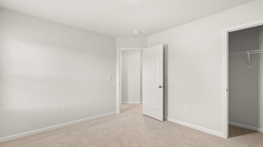 Representative unfurnished interior of a home built from the Somerset by D.R. Horton in Highland Hills, Graniteville (Image 21).