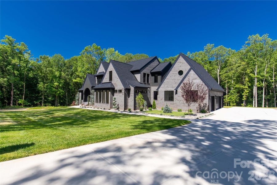 Front exterior of a new home in , Indian Land, SC, highlighting curb appeal (Image 26).