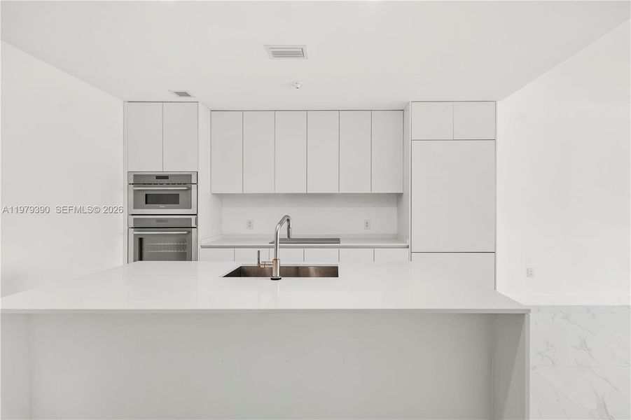 Furnished interior view inside a new home in Aria Reserve, Miami (Image 7).