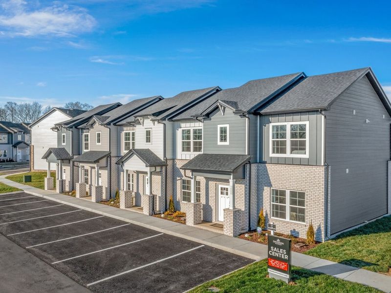 Front exterior of a new home in The Towns at Red River, Gallatin, TN, highlighting curb appeal (Image 24). Front exterior of a new home in The Towns at Red River, Gallatin, TN, highlighting curb appeal (Image 24).