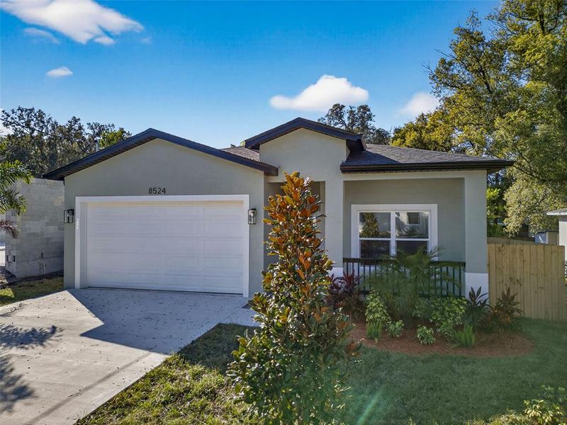 Front exterior of a new home in , Tampa, FL, highlighting curb appeal (Image 25). Front exterior of a new home in , Tampa, FL, highlighting curb appeal (Image 25).