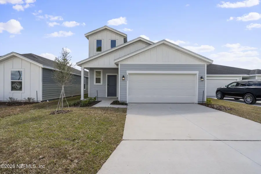 Front exterior of a new home in Cypress Meadows - Classic Series, Jacksonville, FL, highlighting curb appeal (Image 2). Front exterior of a new home in Cypress Meadows - Classic Series, Jacksonville, FL, highlighting curb appeal (Image 2).