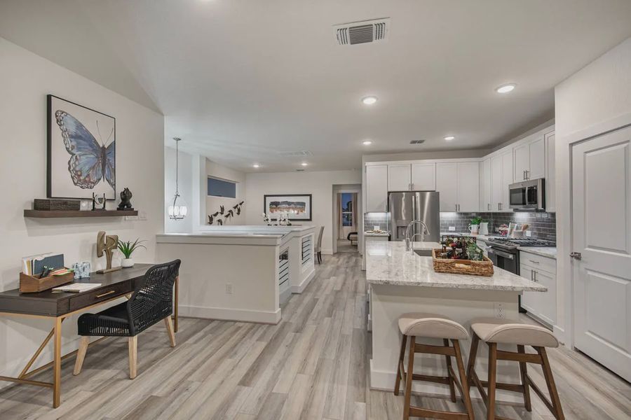 Furnished interior view inside a new home in Centero at Stone Oak, San Antonio (Image 8).