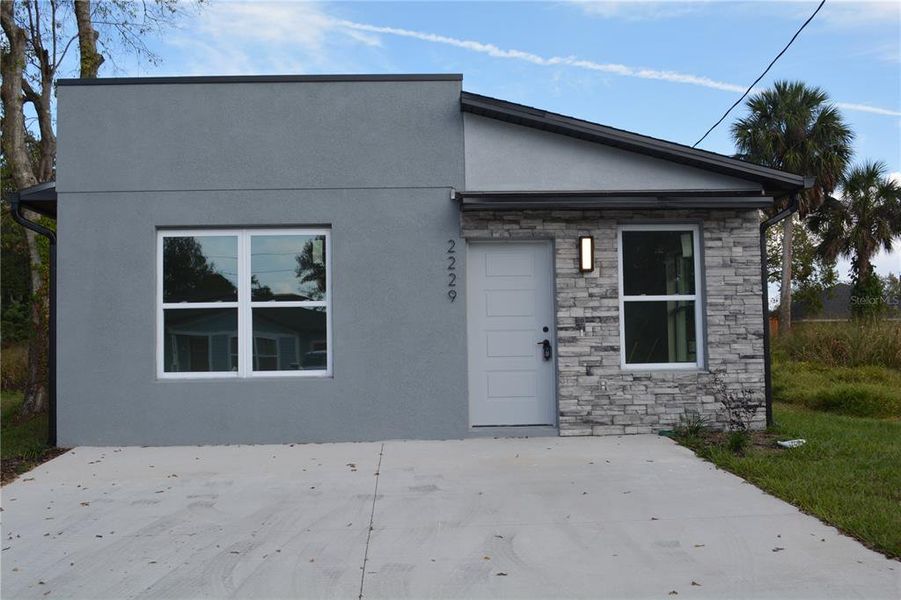 Exterior details and patio area of a home in , Sanford (Image 4).