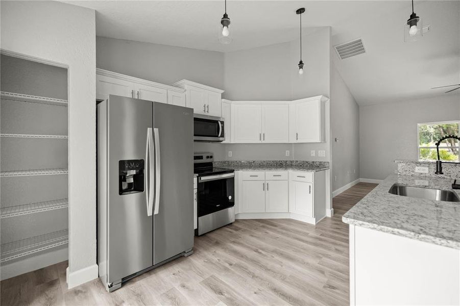 Furnished interior view inside a new home in , Ocala (Image 6).
