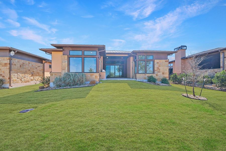 Exterior details and patio area of a home in Lakecliff on Lake Travis, Spicewood (Image 24).