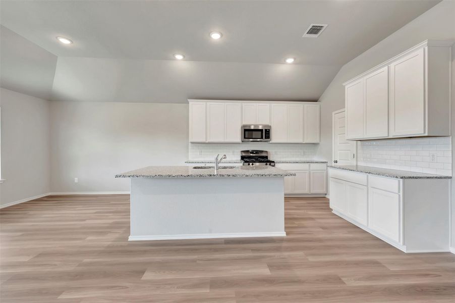 Furnished interior view inside a new home in Carillon, Manor (Image 8).
