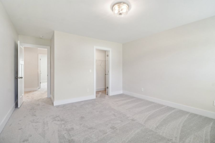 Representative unfurnished interior of a home built from the Sonoma II by Great Southern Homes in Edwards Ridge, Central (Image 32).