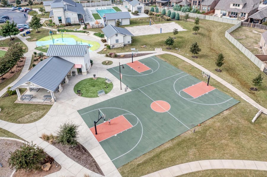 View of sport court with a lawn, community basketball court, a residential view, and a patio area