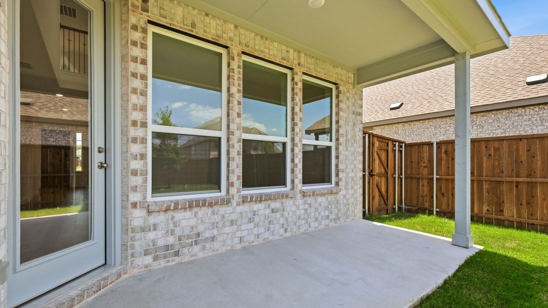 Exterior details and patio area of a home in Anna Ranch, Anna (Image 27).
