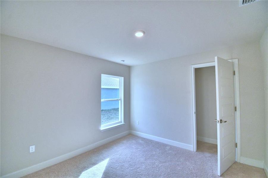 Spacious, unfurnished interior of a new home in Cadence Crossing, Auburndale (Image 16).