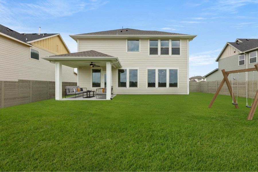 Exterior details and patio area of a home in Cottage Collection at Harvest, Argyle (Image 3).