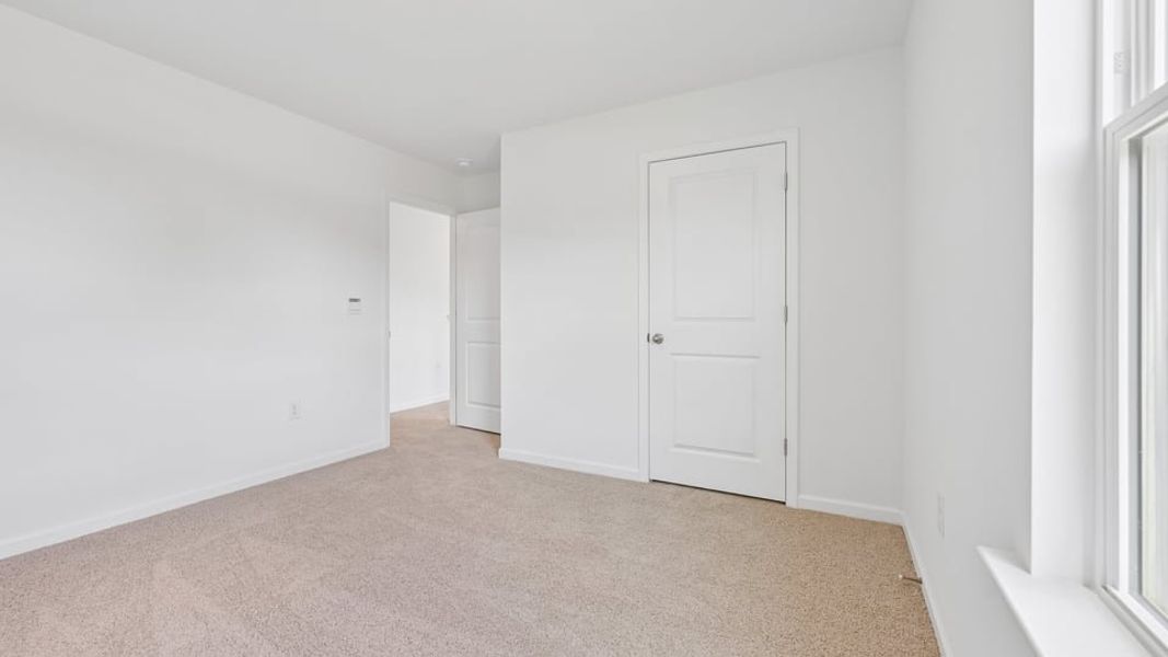 Spacious, unfurnished interior of a new home in Mason Ridge, Spring Lake (Image 31).