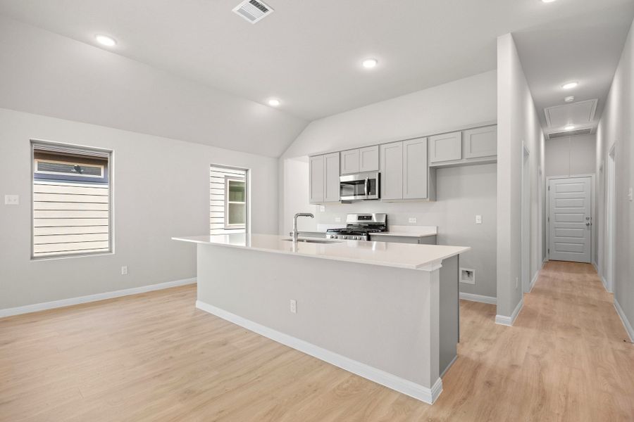 Kitchen in the Spruce home plan by Trophy Signature Homes - REPRESENTATIVE PHOTO Kitchen in the Spruce home plan by Trophy Signature Homes - REPRESENTATIVE PHOTO