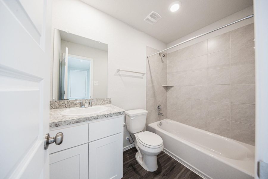 Furnished interior view inside a new home in Townsend Reserve, Splendora (Image 8).