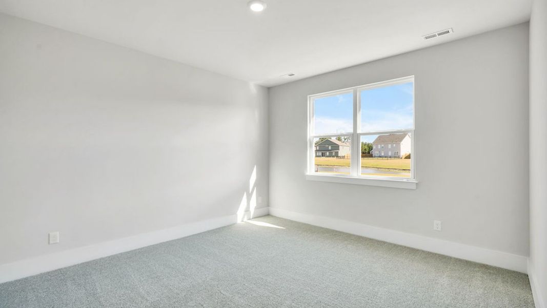 Representative unfurnished interior of a home built from the ACADIA by D.R. Horton in Rolling Hills, Bolivia (Image 30).