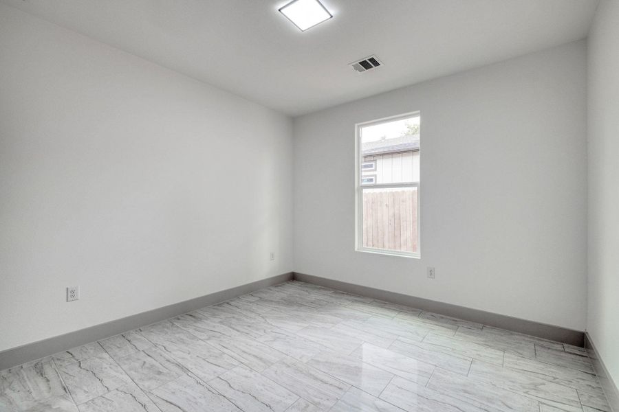Empty room featuring baseboards Empty room featuring baseboards