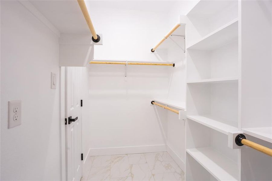Walk-in closet in master bathroom