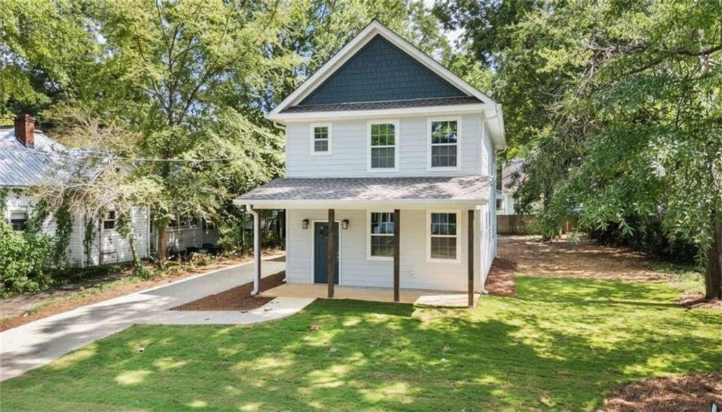 Front exterior of a new home in , Cedartown, GA, highlighting curb appeal (Image 16).