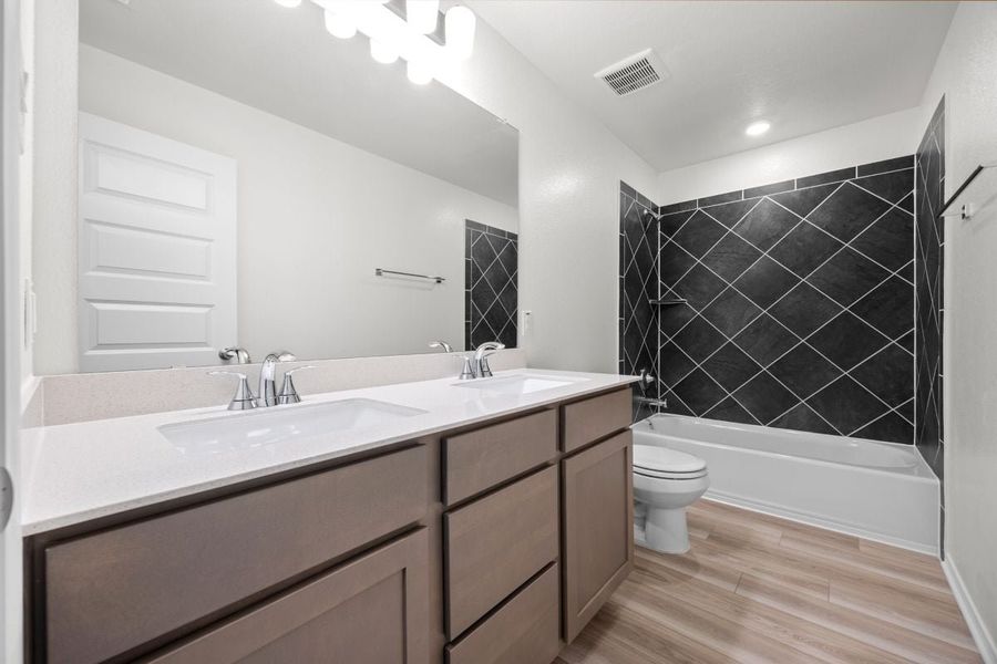 Furnished interior view inside a new home in Salerno - Hallmark Collection, Round Rock (Image 14).