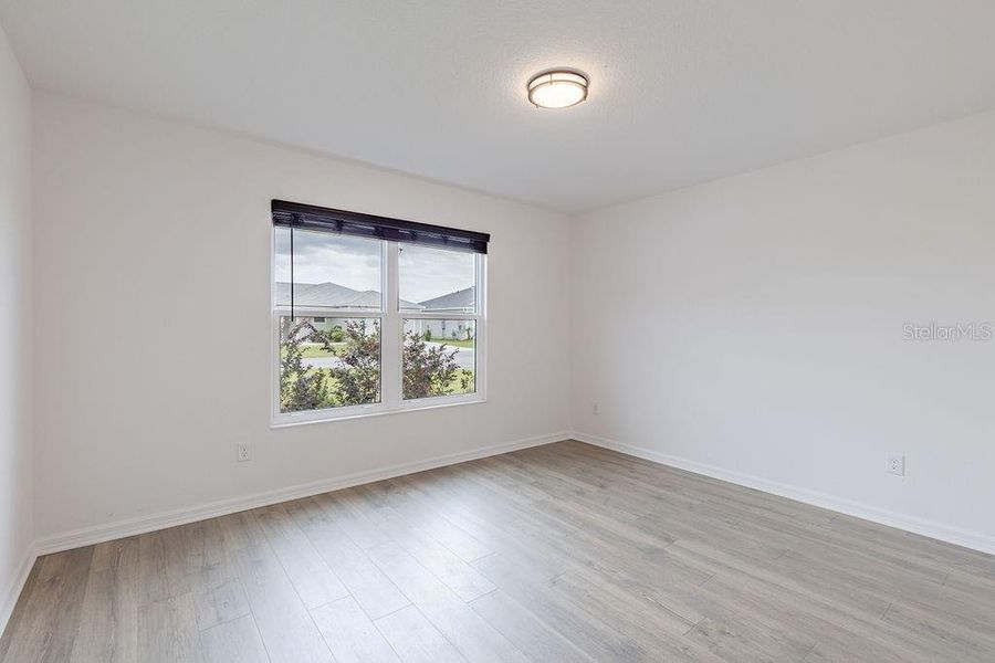 Spacious, unfurnished interior of a new home in , The Villages (Image 20).
