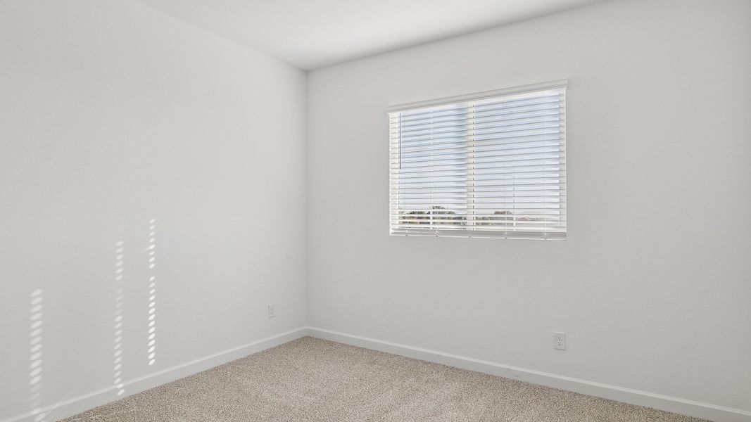Spacious, unfurnished interior of a new home in Apache Farms, Buckeye (Image 28).