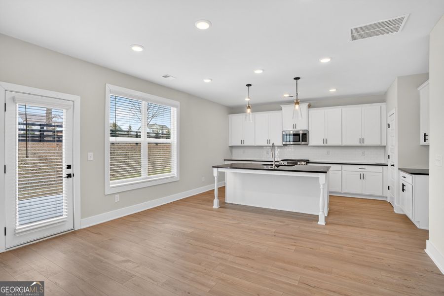 Furnished interior view inside a new home in The Fairways at Mirror Lake, Villa Rica (Image 7).