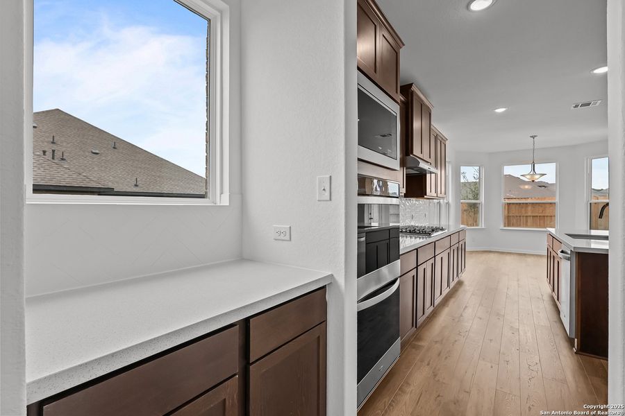 Furnished interior view inside a new home in Homestead 75', Schertz (Image 15).
