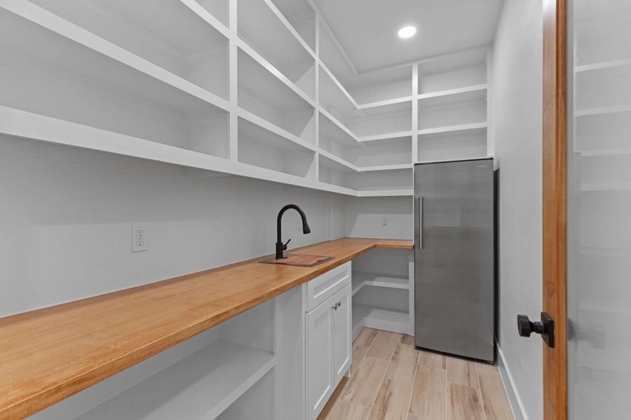 Storage area featuring a sink Storage area featuring a sink