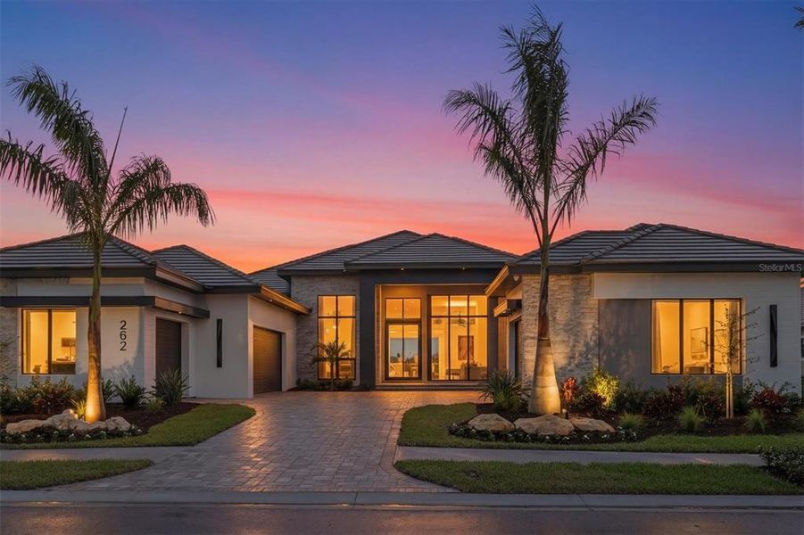 Front exterior of a new home in , Sarasota, FL, highlighting curb appeal (Image 21).