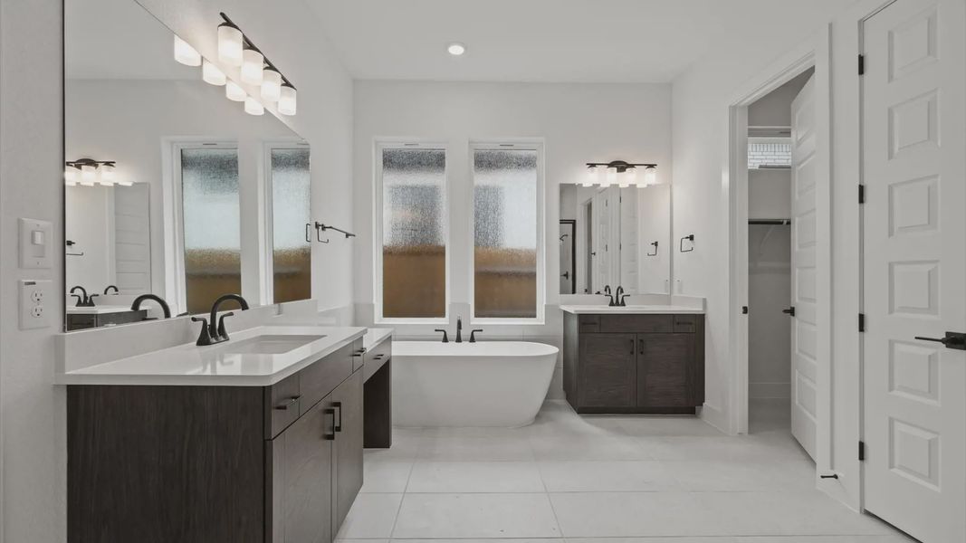 Furnished interior view inside a new home in 6 Creeks, Kyle (Image 10).