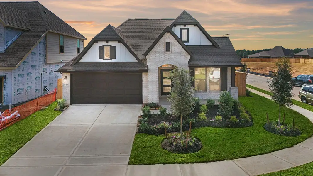 Front exterior of a new home in Escondido, Magnolia, TX, highlighting curb appeal (Image 1). Front exterior of a new home in Escondido, Magnolia, TX, highlighting curb appeal (Image 1).