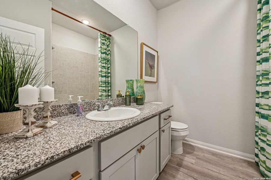 Furnished interior view inside a new home in Villas Las Flores, Floresville (Image 4).