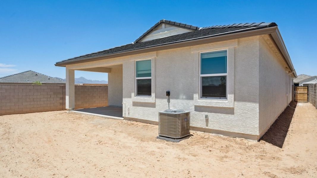 Exterior details and patio area of a home in Moonlight, Maricopa (Image 2). Exterior details and patio area of a home in Moonlight, Maricopa (Image 2).