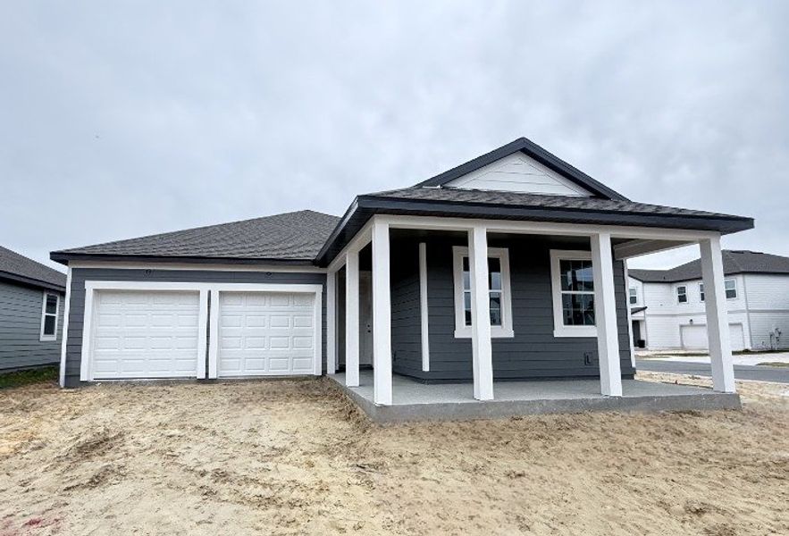 Exterior details and patio area of a home in Trailside, Mount Dora (Image 3).