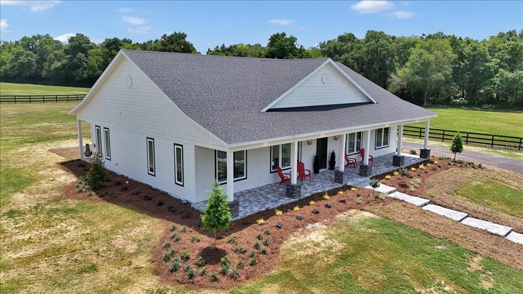 Front exterior of a new home in , Citra, FL, highlighting curb appeal (Image 27).