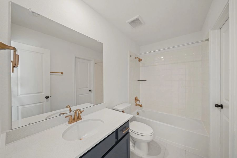 Private bath. "Note: Sample product photo. Actual exterior and interior selections may vary by homesite. Photo may be virtually staged