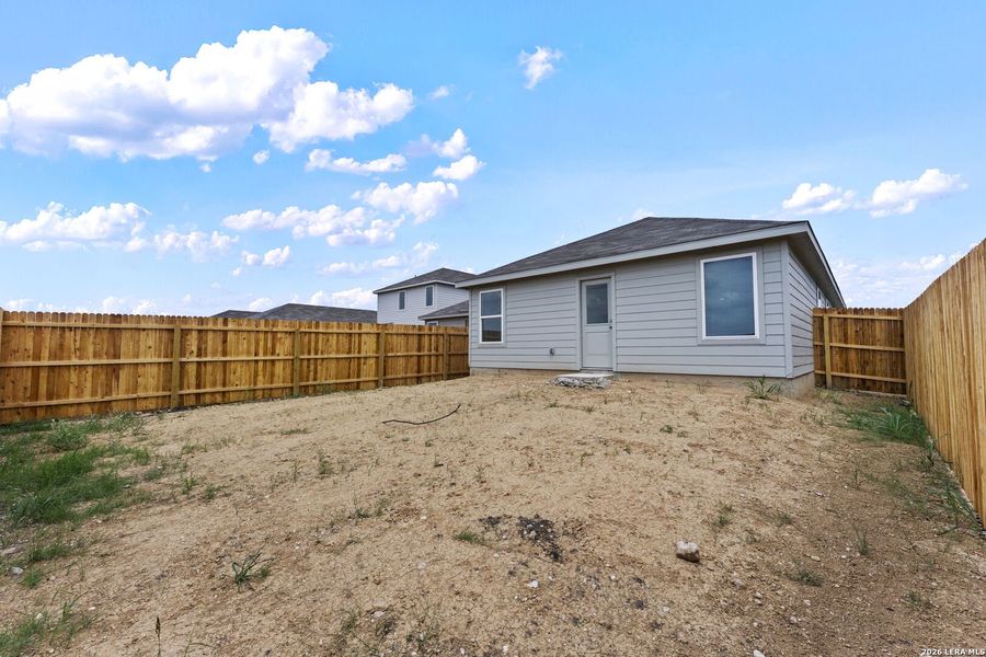 Exterior details and patio area of a home in Spring Grove, St. Hedwig (Image 3).